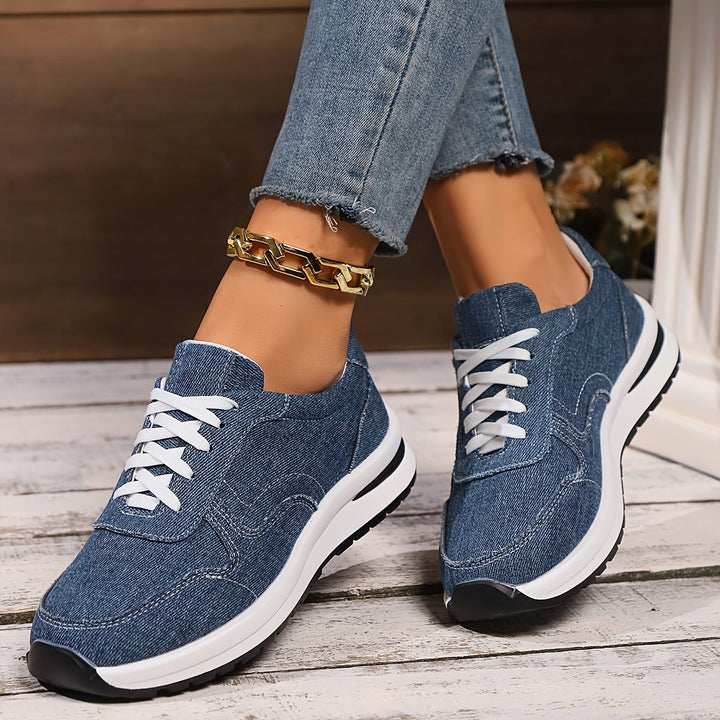 Denim-inspired sneakers shown from front and side
