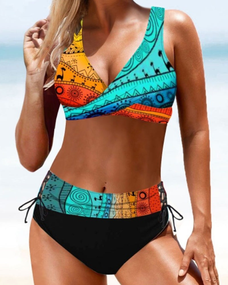 Female model wearing a beach-ready bikini with a clean coastal background.