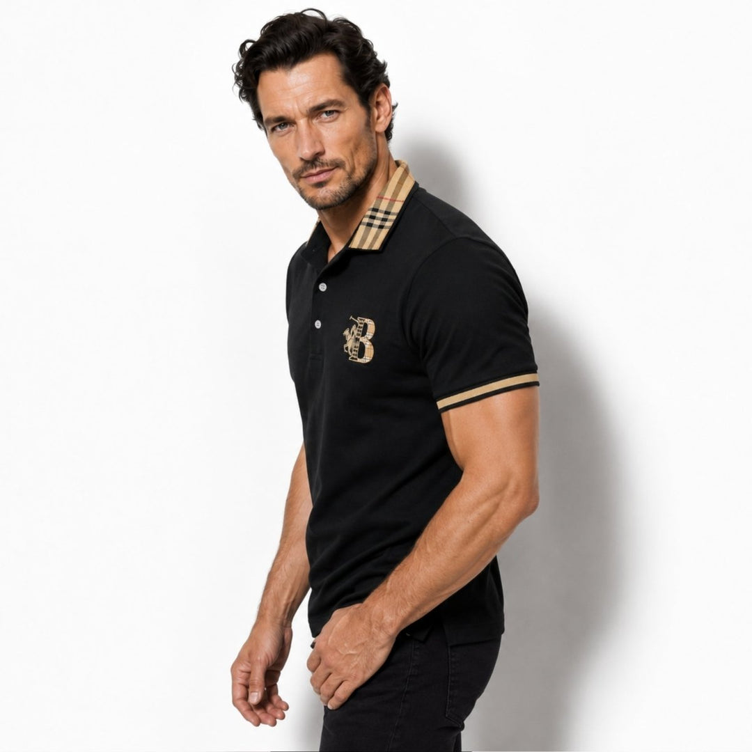  Model showcasing a smart casual polo shirt with check sleeve accents on a plain background.