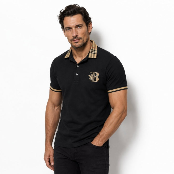  Model wearing a short sleeve polo shirt with button placket and check collar on a plain background.