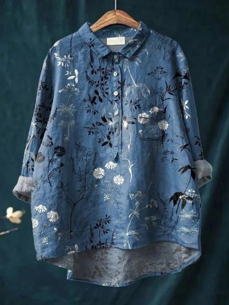 Relaxed floral top with pocket detail for casual styling.