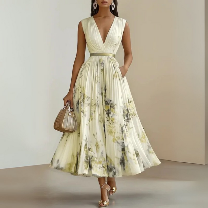 Female model wearing a refined pleated outfit for sunny day styling.