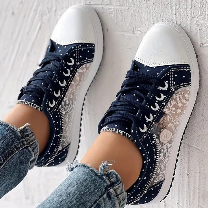 Side angle navy white shoes with floral transparent panel