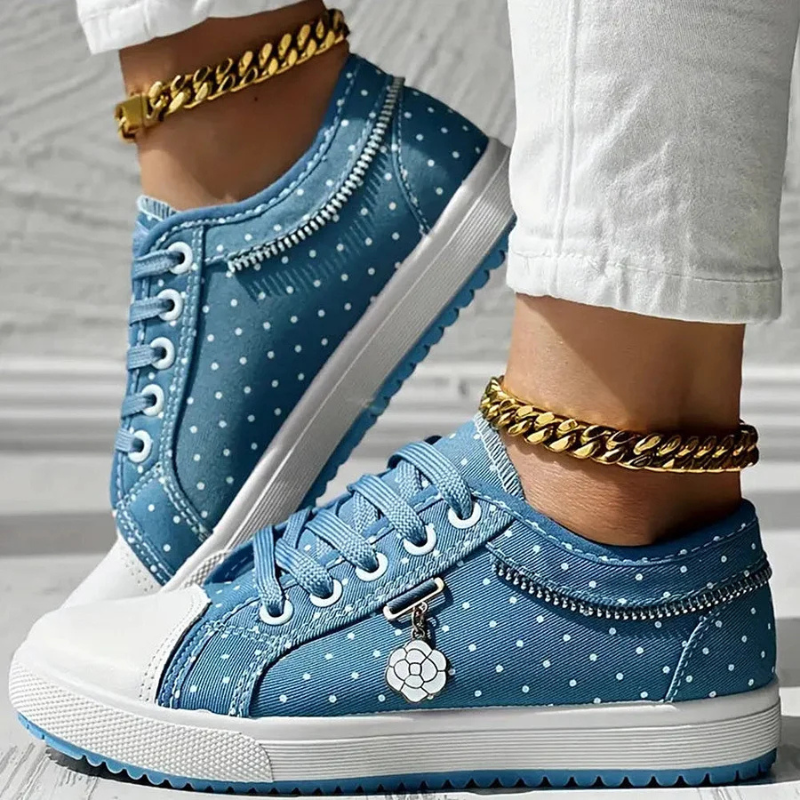 Low cut blue dotted shoes with white rubber sole 