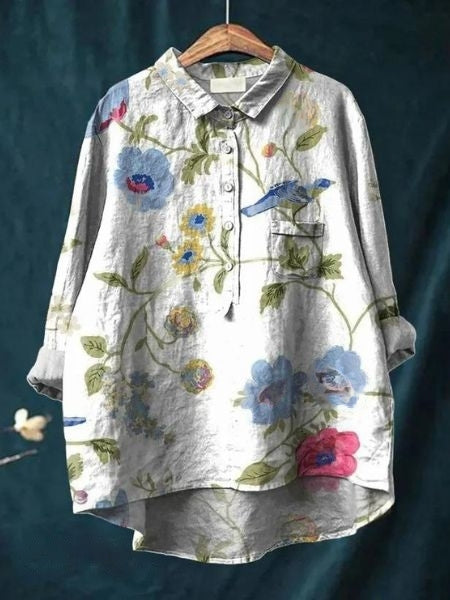 Women’s floral summer top with stylish button front design.