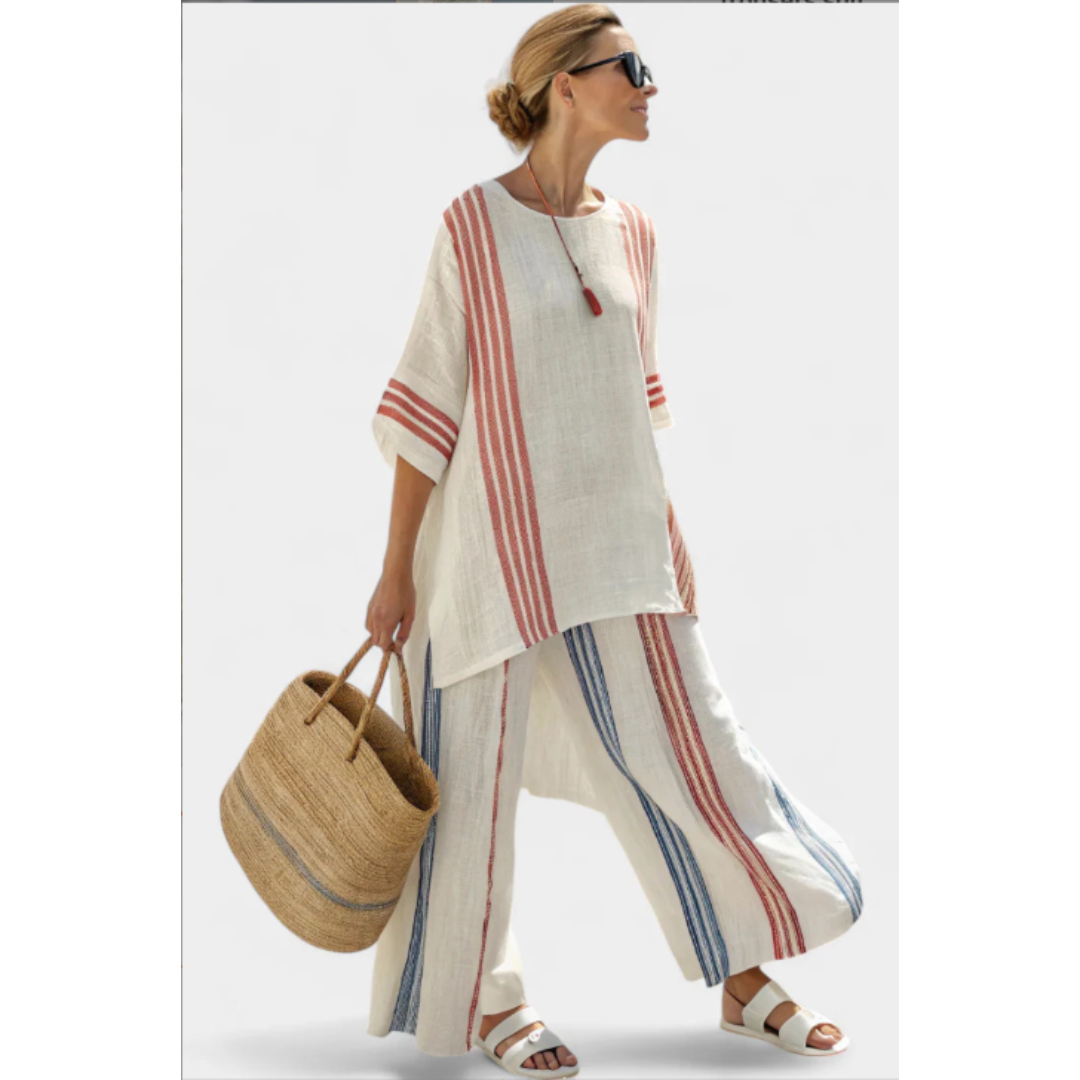 Woman styling a striped two-piece outfit on plain white background