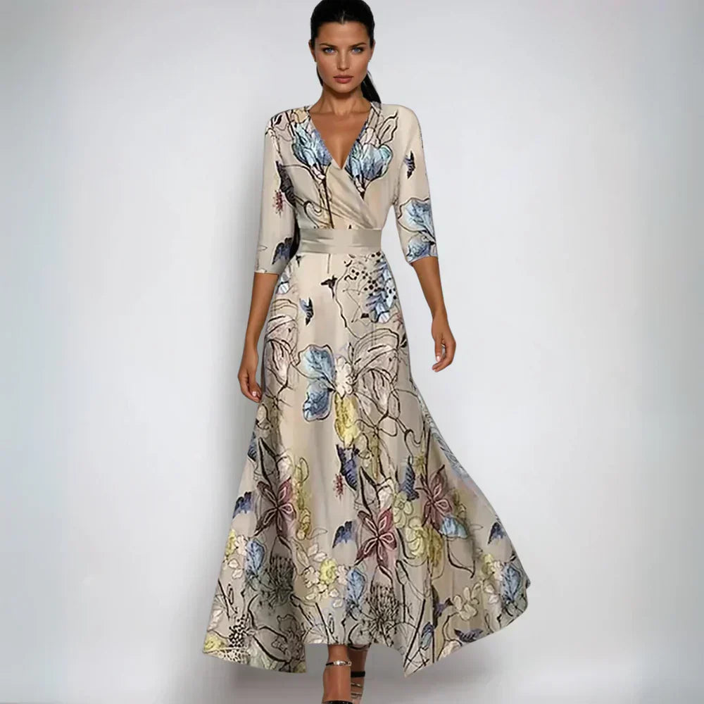 Lady showcasing a V-neck floral wrap maxi dress with belted waist.