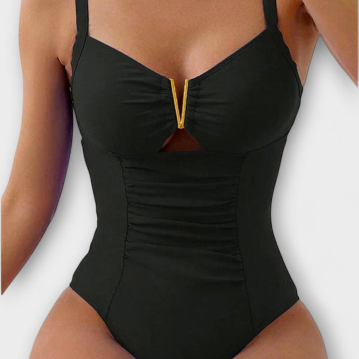 Chic one-piece bathing suit ideal for lounging by the pool.