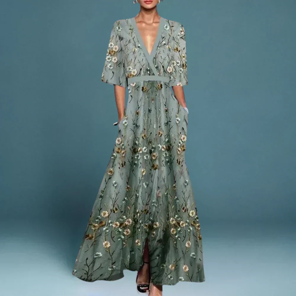 Floral maxi wrap dress front with aqua background