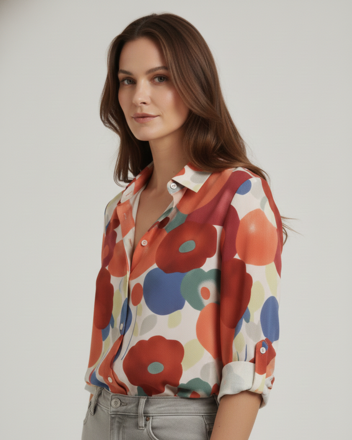 Colourful floral button-up shirt on white studio background