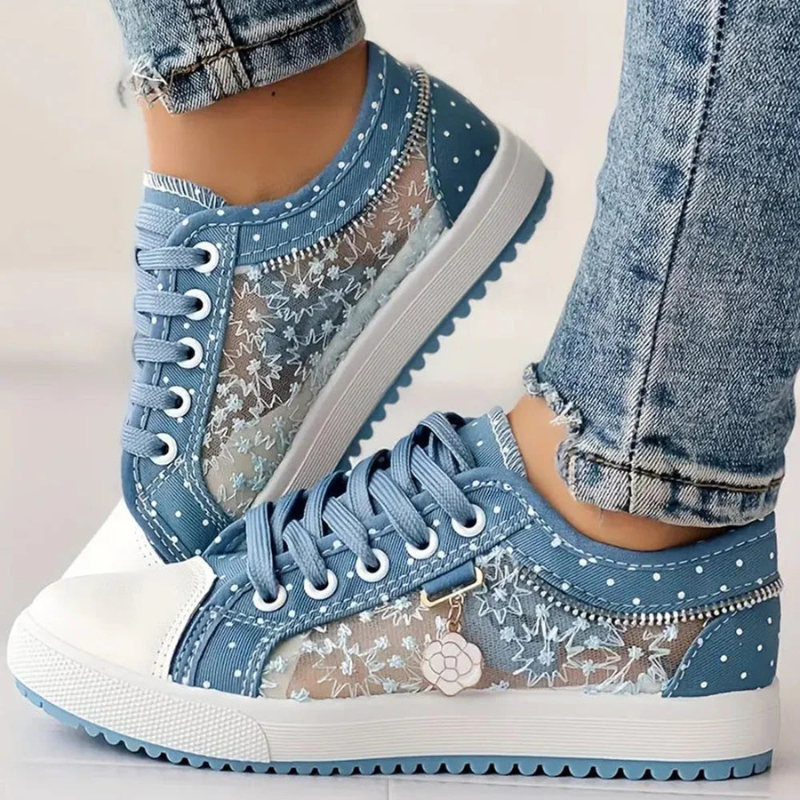 Blue floral lace shoes front angle on white