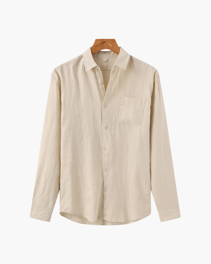 A mart casual shirt with chest pocket on a plain background.