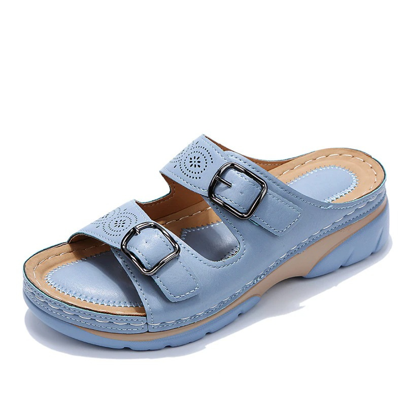 Women's walking sandals in plain background