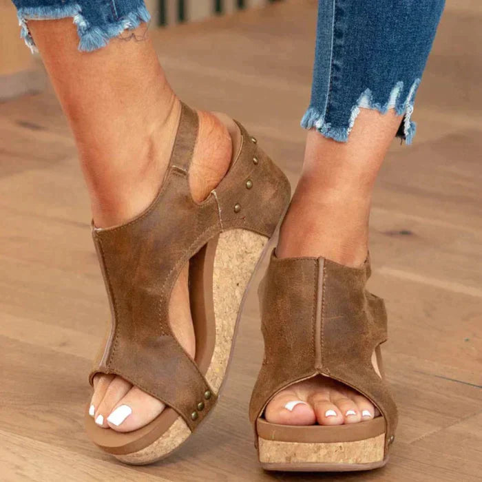 Foot model front straight wedge sandals plain background studio shot