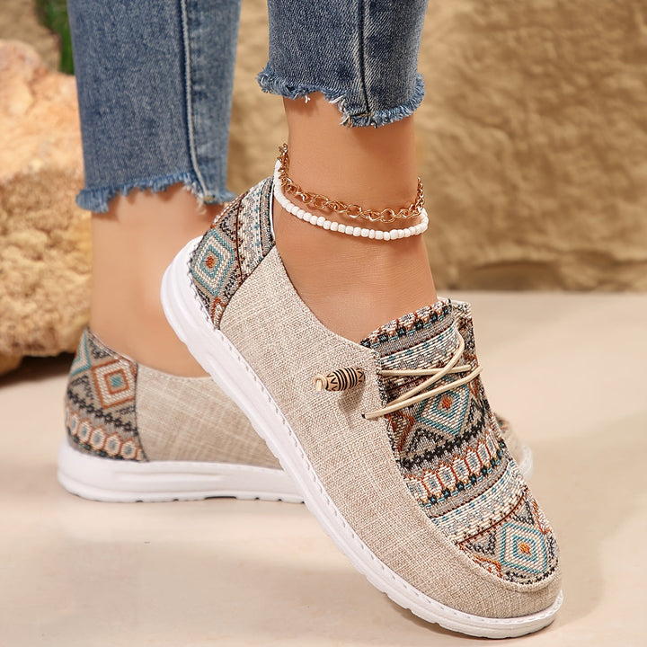 Beige slip-on sneakers with geometric woven front detail