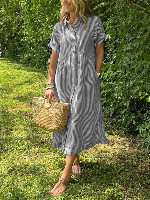  Female model displaying a striped shirt suitable for everyday styling on a plain background.