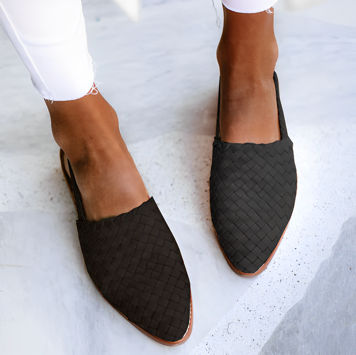 Top view of minimalist women’s shoe on clean plain background