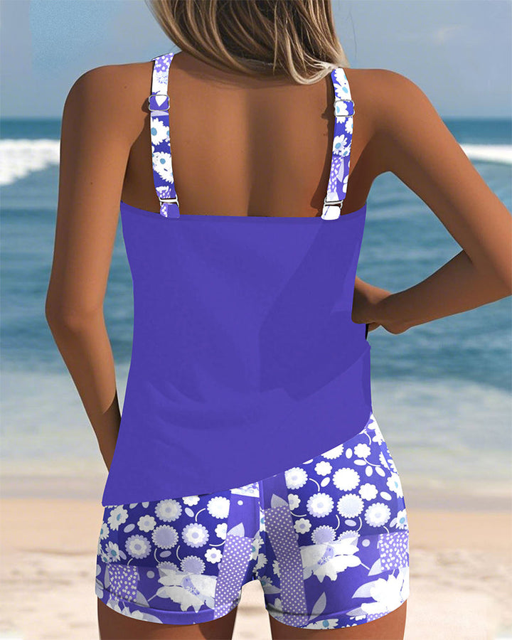 Female model in a coordinated swimsuit set with a beach background.