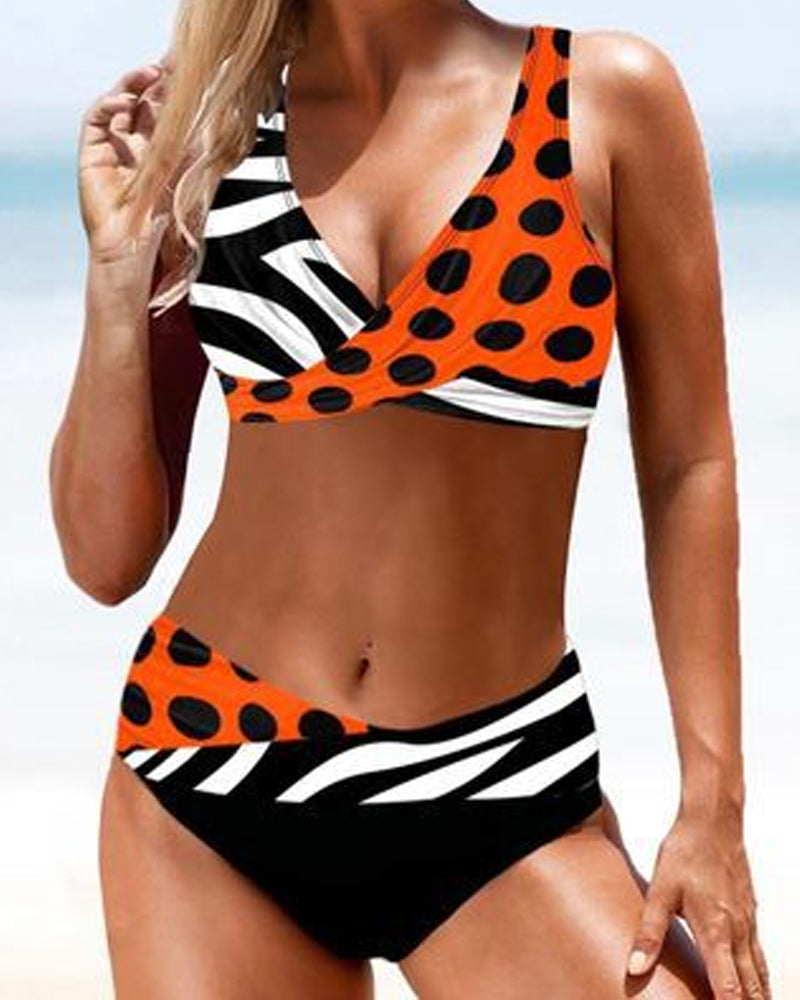 Female model wearing a summer bikini with a beach background for resort-ready swimwear.