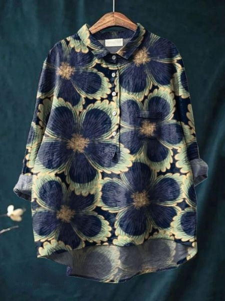 Relaxed fit floral blouse with button front styling.