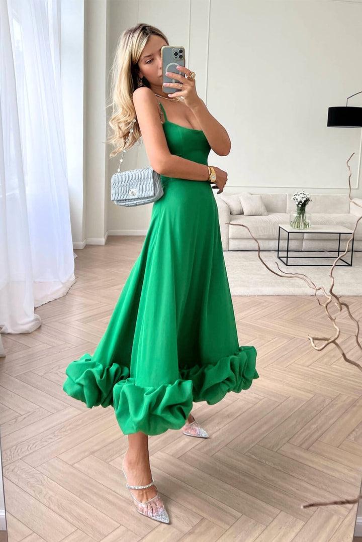 Stylish green slight side view eveningwear dress