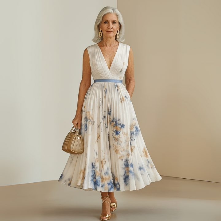 Female model in a graceful pleated outfit suited for casual daytime plans.