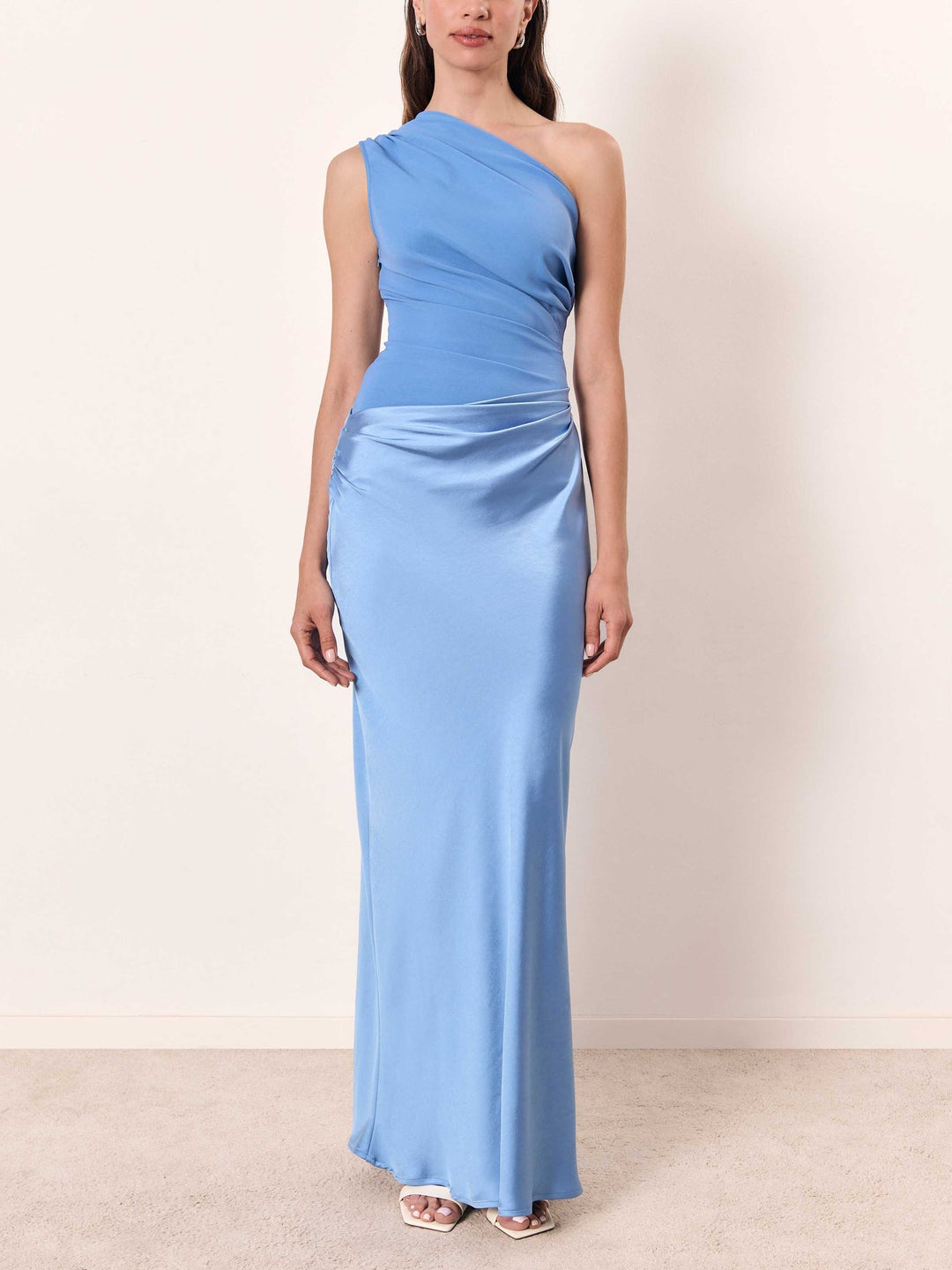 Long formal dress beige background
