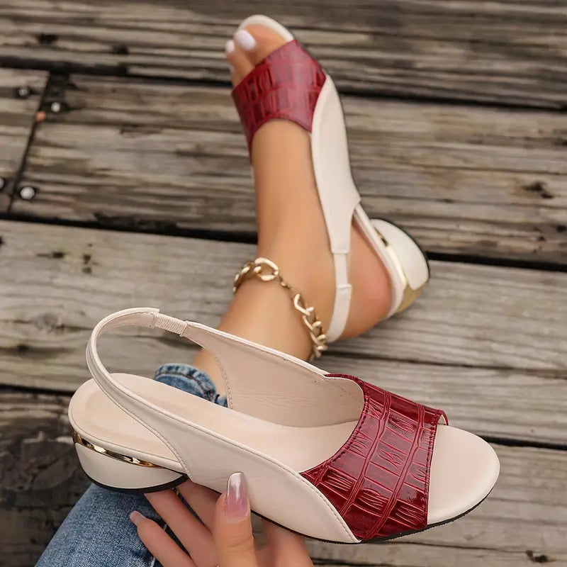  Woman displaying casual sandals designed for everyday wear on a plain background.