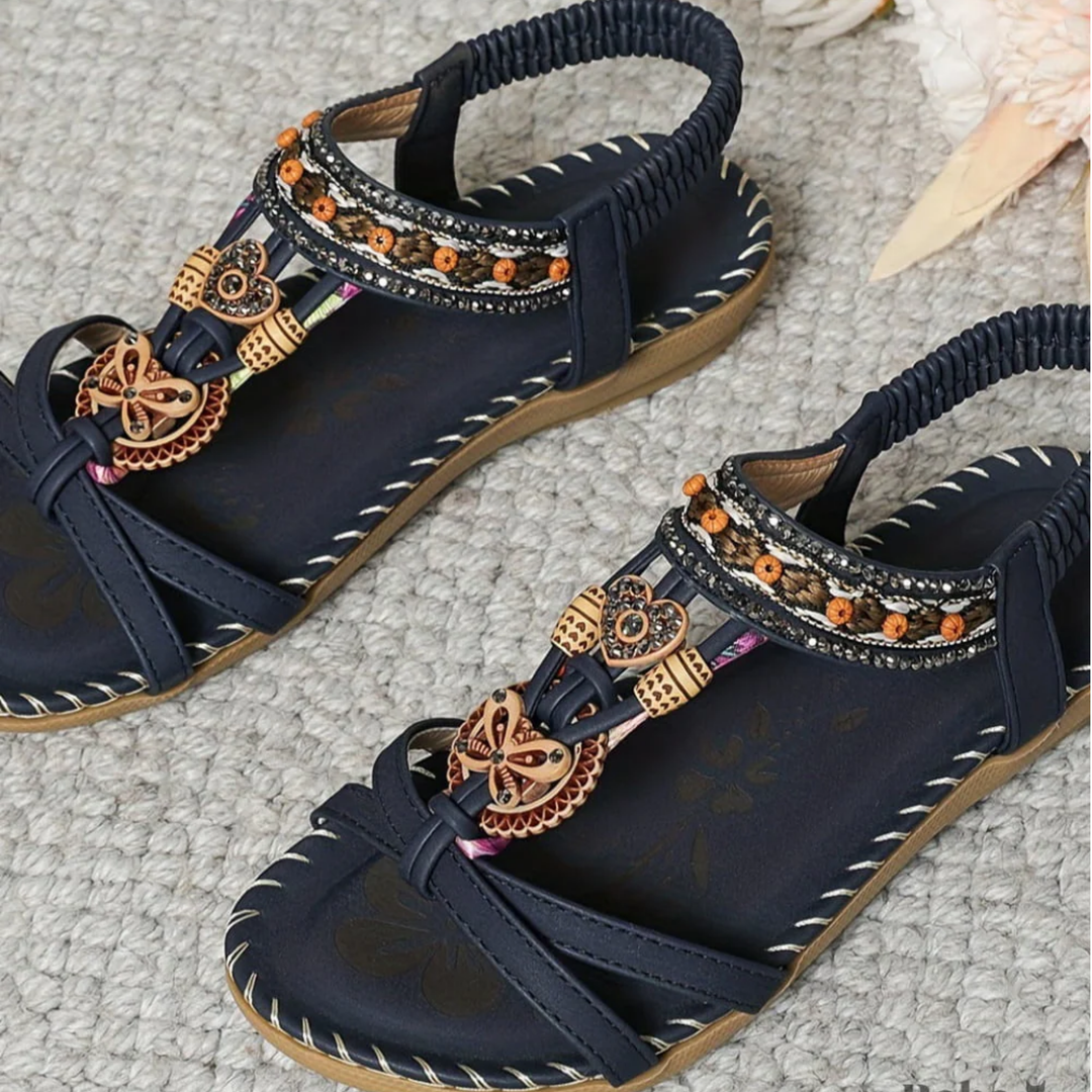 Versatile sandals suitable for casual and dressy outfits on a plain background.