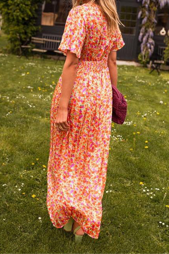 Pink orange floral dress with ruched waistline back angle