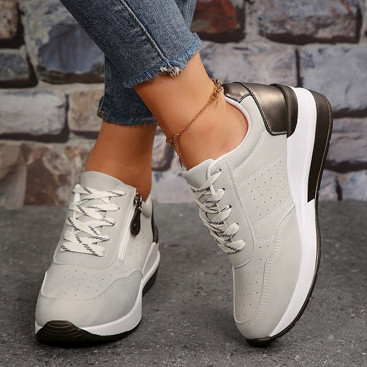 Daily wear zipper up and lace sneaker shown in side angle