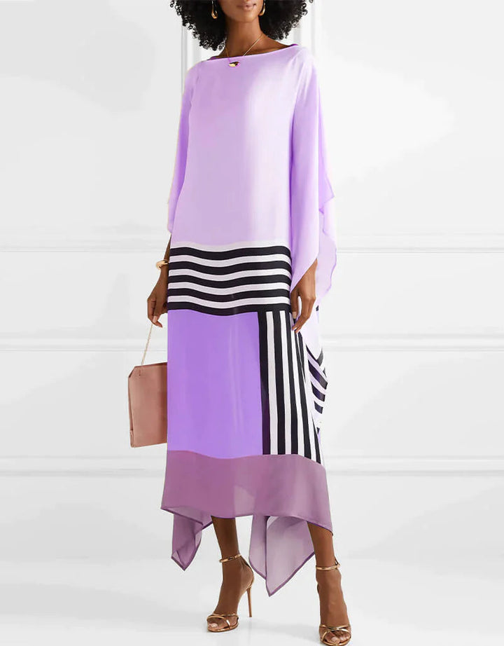 Lightweight resort kaftan shown on a model with a plain background.