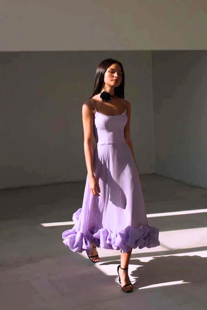 Outdoor fashion photo of purple evening dress