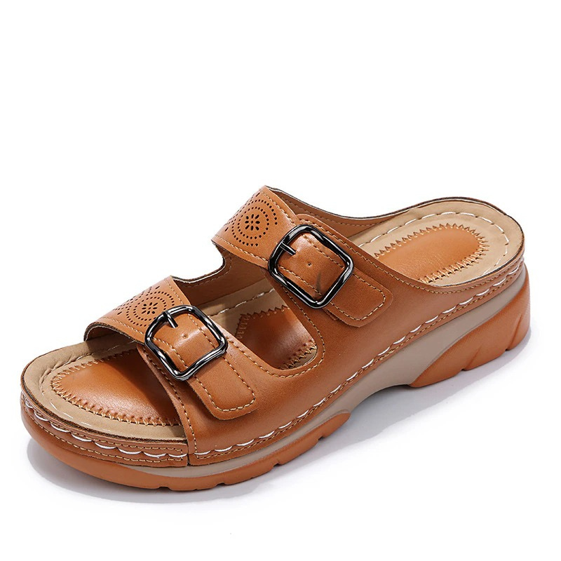 Top angle showcasing full sandal design on foot white background