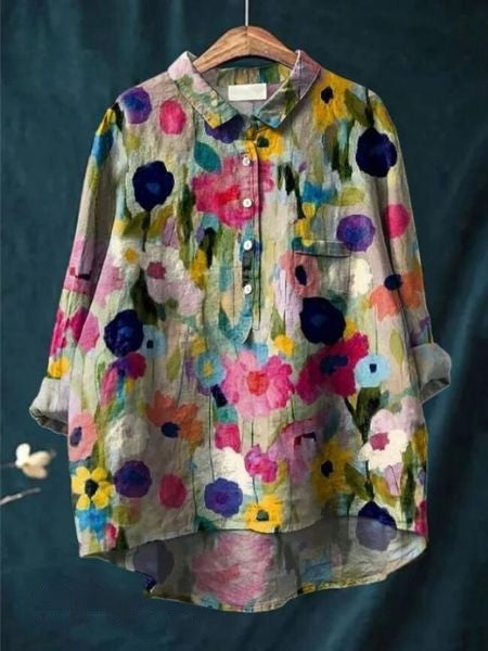 Button front floral blouse with breathable relaxed shape.