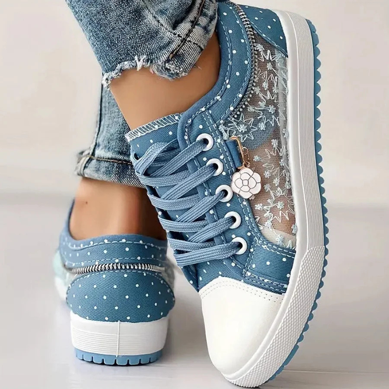 Pair of blue casual shoes on white background