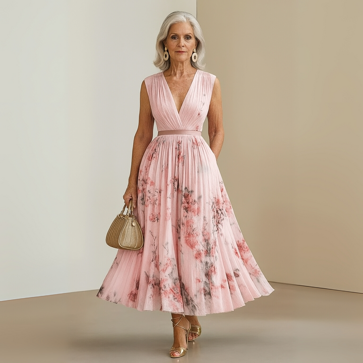 Lightweight pleated women’s outfit shown on a clean plain background.