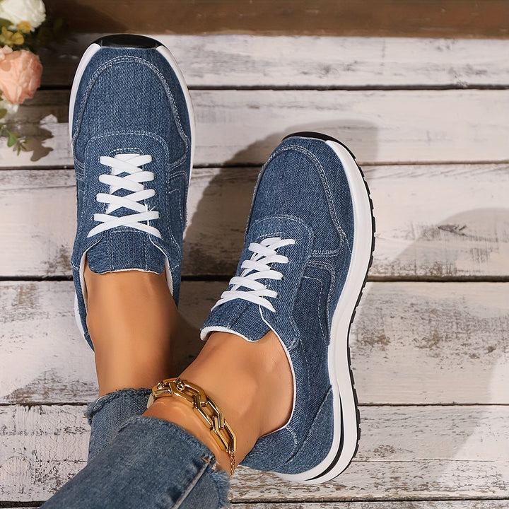 Casual denim shoes on model with gold anklet