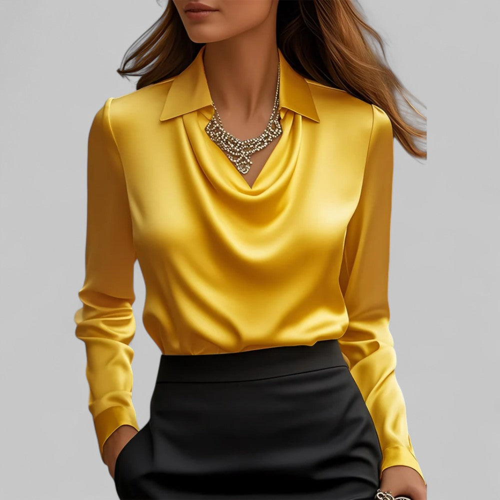 Woman model wearing a polished long sleeve blouse with graceful draped detail