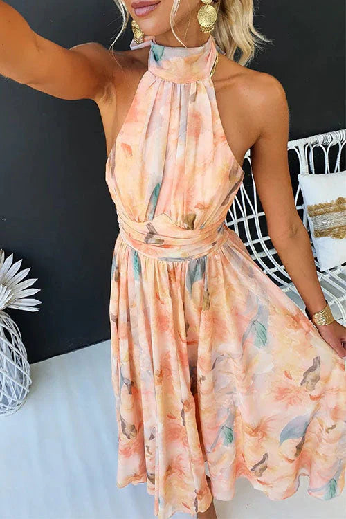Model wearing a floral empire waist maxi dress 