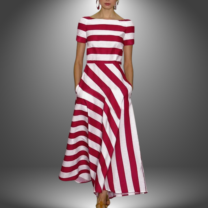 Woman model wearing a striped A-line midi dress against a clean background.