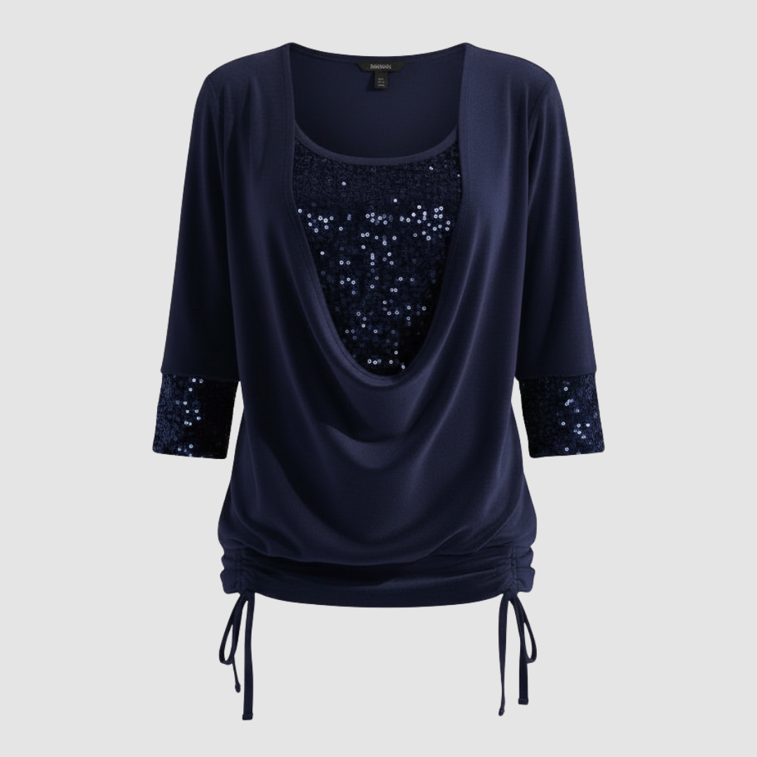 Feminine blouse with soft sparkling detail.