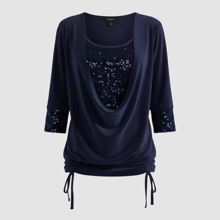 Feminine blouse with soft sparkling detail.
