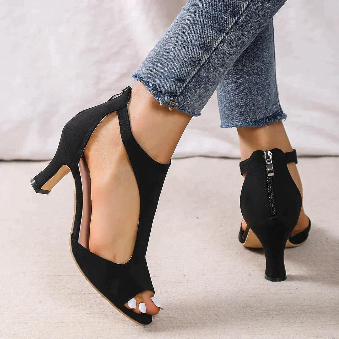 Back view breathable heel sandals plain background clear product focus