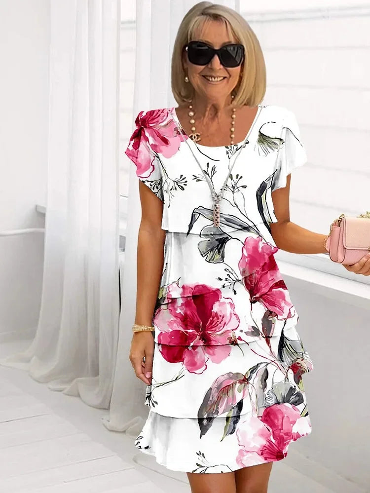 Front view pink floral layered dress on model