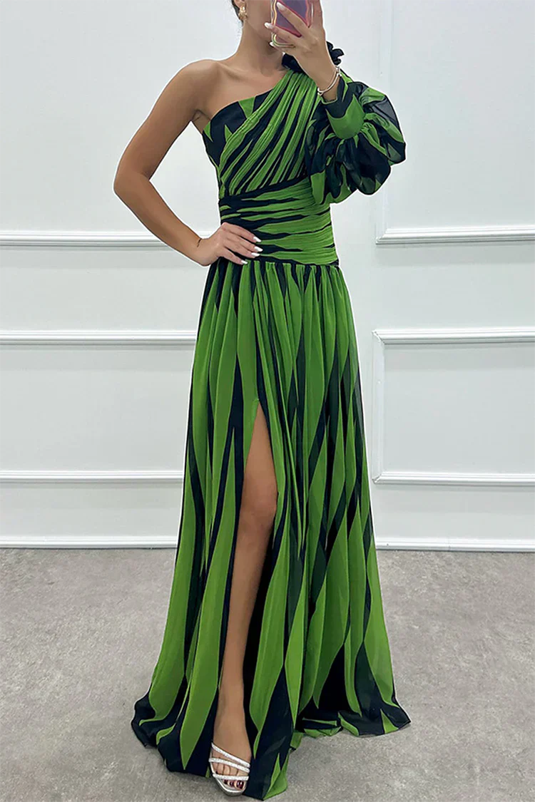 Woman in a striped dress with a sculpted waist and pleated skirt.