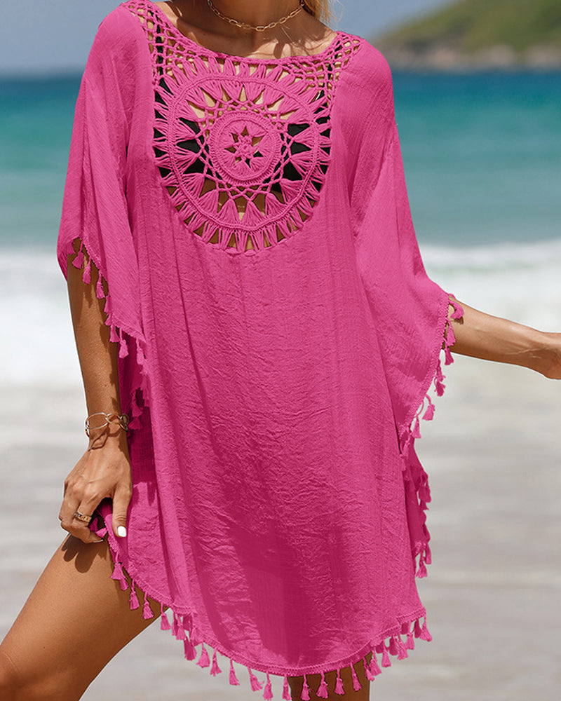 Flowy beachwear cover-up with soft fabric and boho detailing.