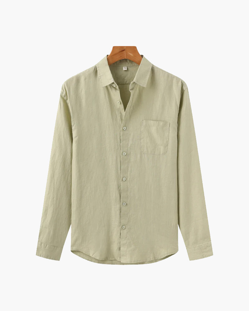 A relaxed fit shirt with button front on a plain background.