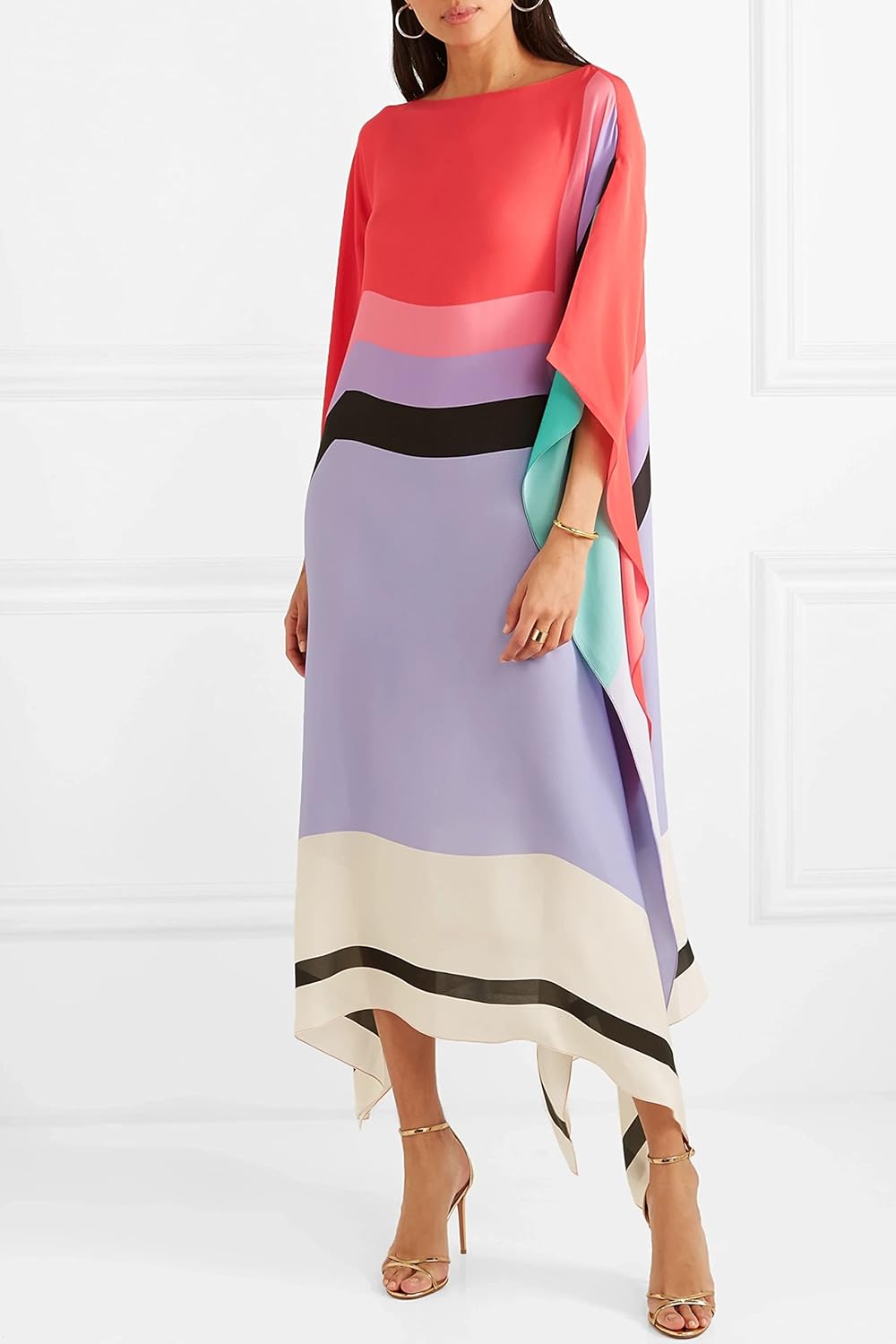 Vibrant resort kaftan displayed on a model with a plain background.