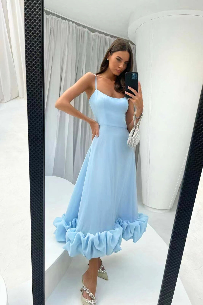 Elegant blueish occasionwear dress in mirror setting